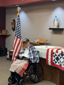 ex-military posing after pinning ceremony