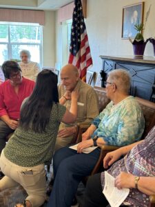 man receiving pin for ceremony